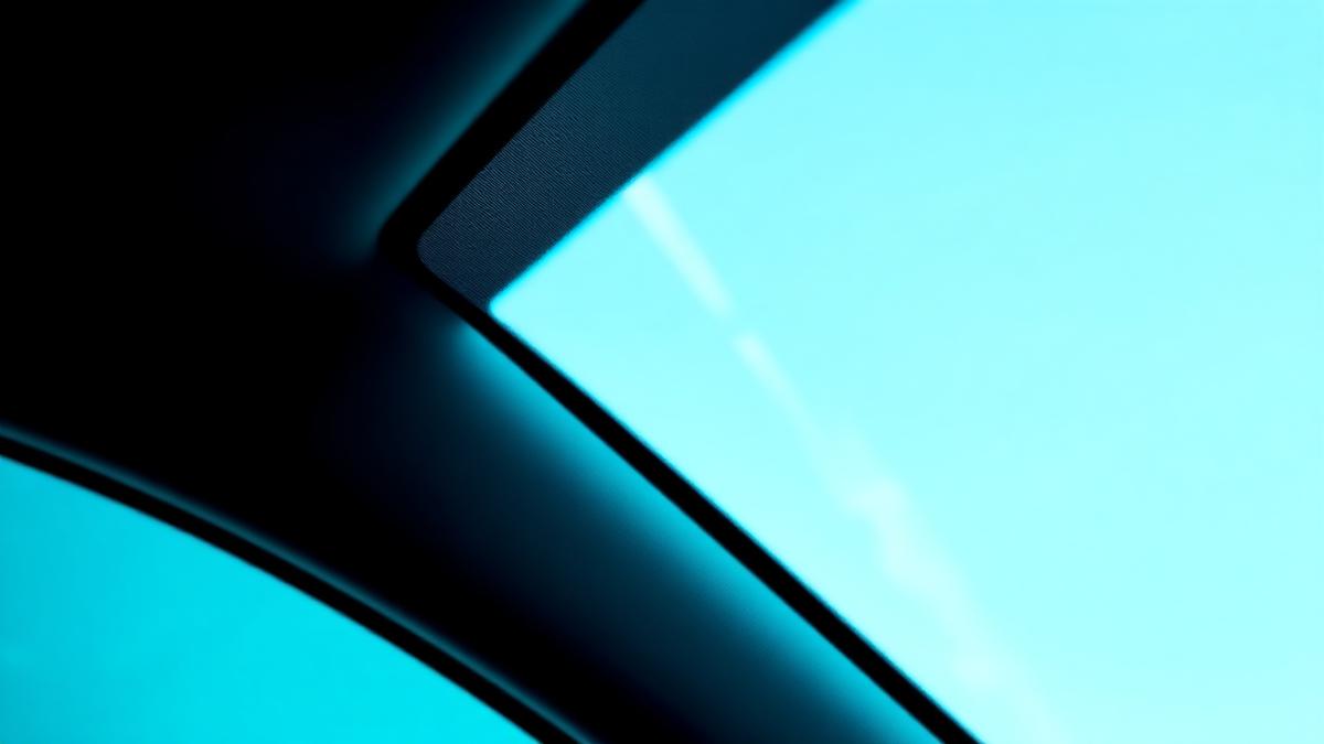Dark sun strip along the top edge of a car windshield seen from inside
